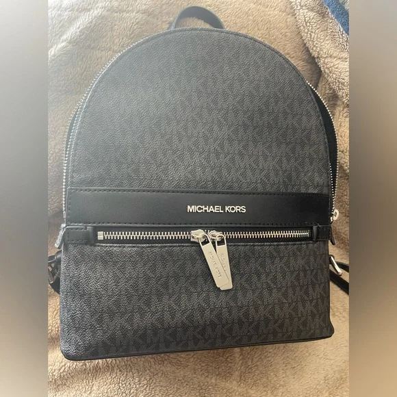 Michael Kors back pack in black. It has only been carried about 4 months. Michael Kors Jaycee XS Mini Convertible Backpack, MK  main image 2